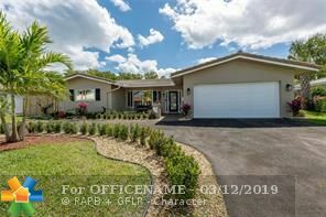 Property Photo:  1440 SE 14th Ct  FL 33441 