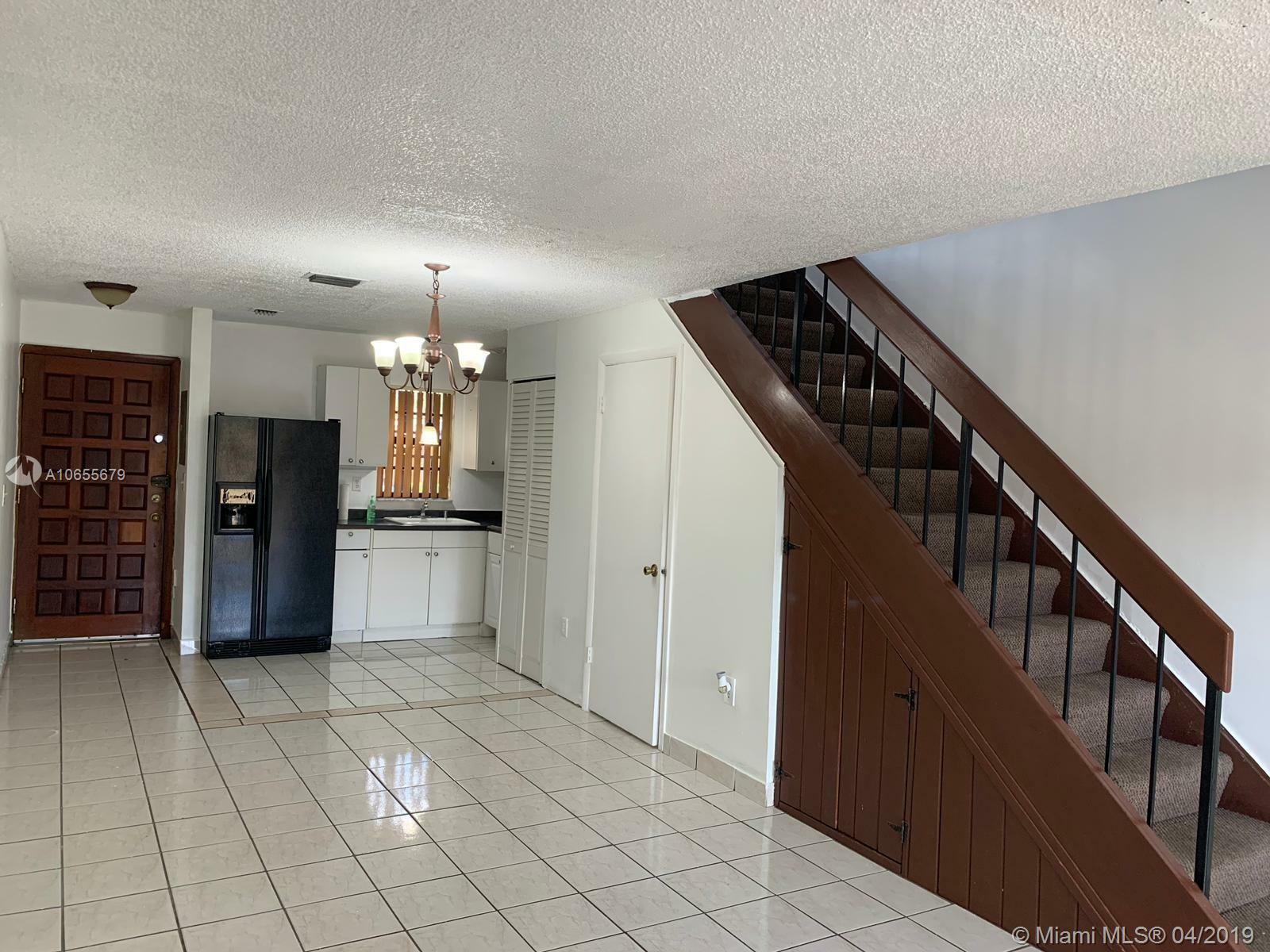 Property Photo:  11795 SW 18th St 9-31  FL 33175 