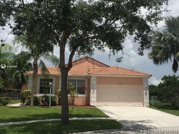 Property Photo:  13201 NW 12th St 1  FL 33028 