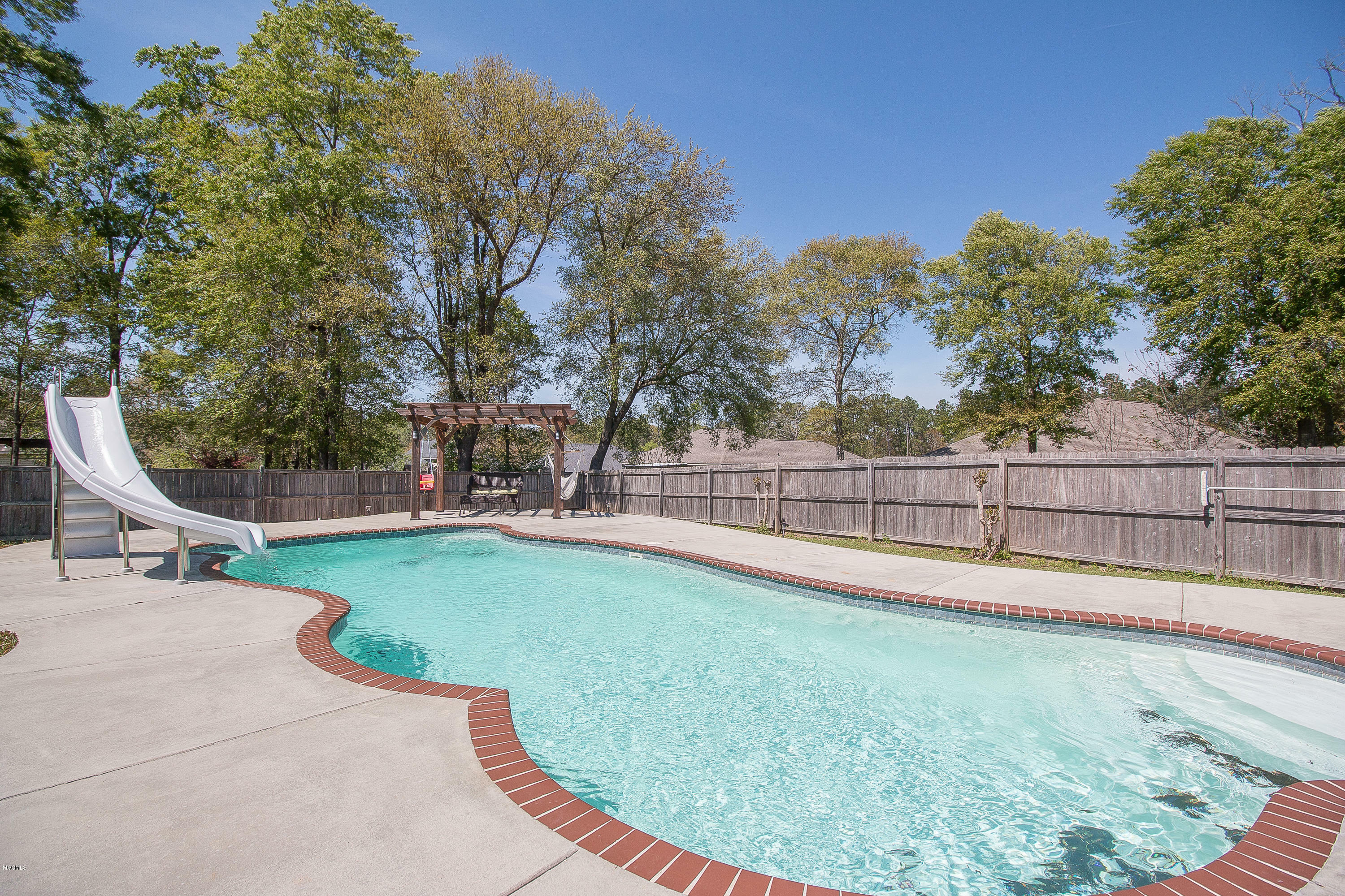 Property Photo: 13212 Meadowland Court MS 39503