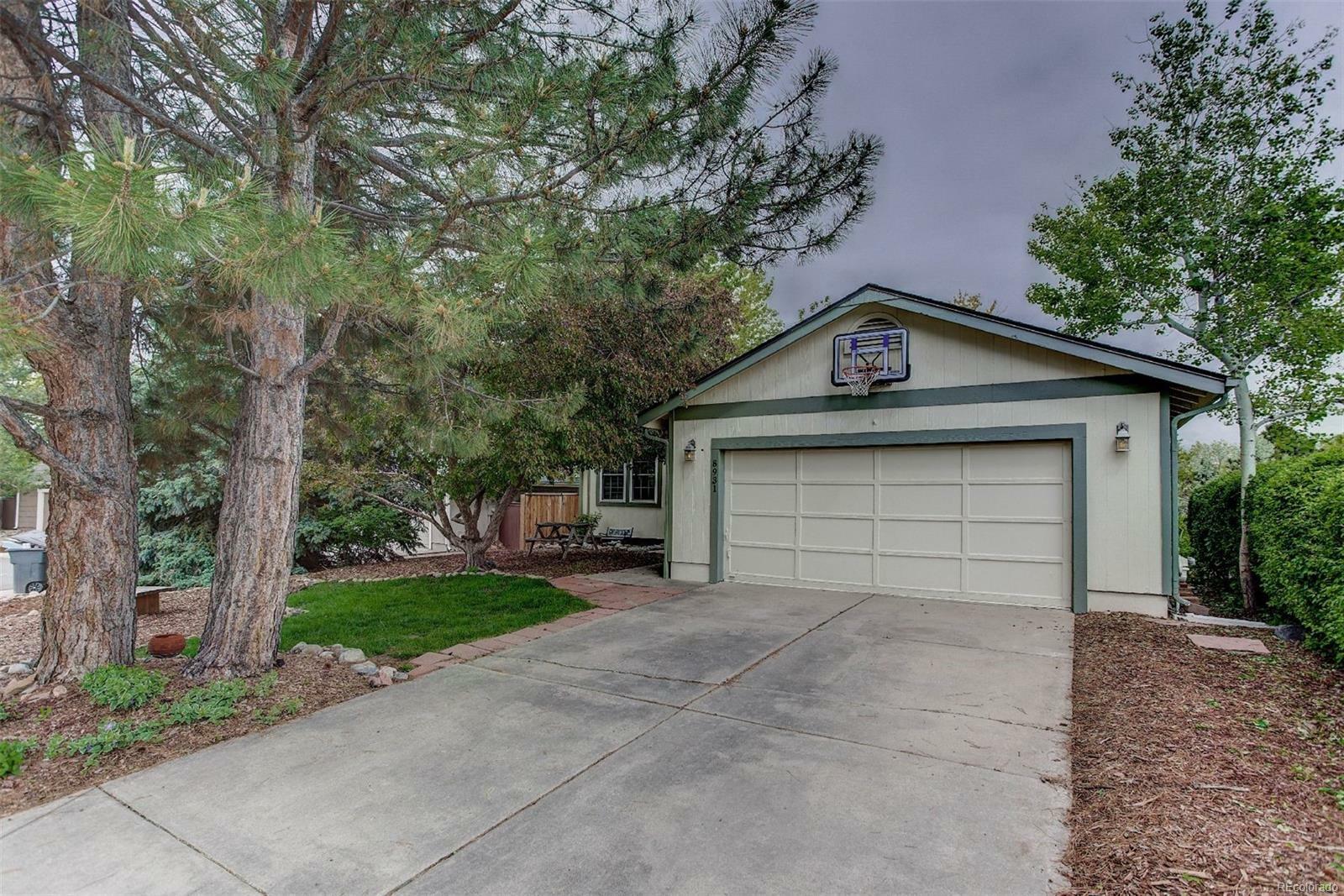 Property Photo:  8931 S Coyote Street  CO 80126 