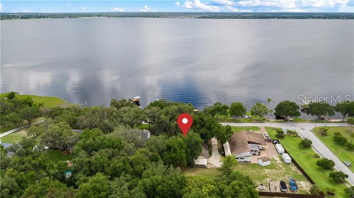 Property Photo:  16328 Lakeshore Drive  FL 34715 