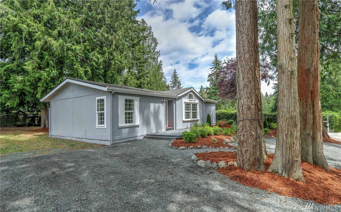 Property Photo:  6988 NE Whispering Cedar Lane  WA 98392 