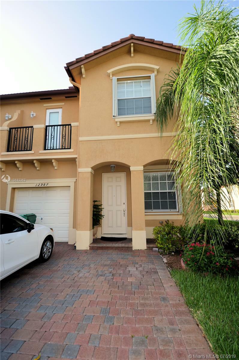 Property Photo:  12987 SW 133rd St  FL 33186 