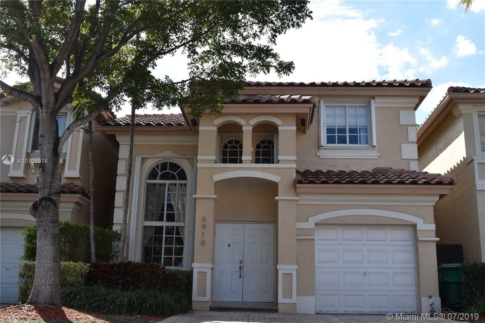 Property Photo:  6918 NW 109th Ct  FL 33178 