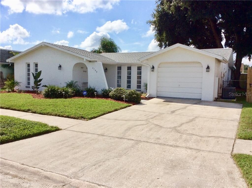 Property Photo:  6709 Ranchwood Loop  FL 34653 