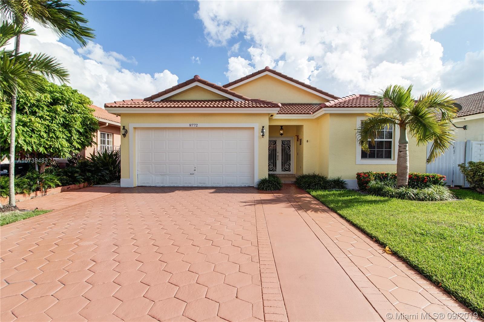 Property Photo: 8772 NW 146th Ln FL 33018