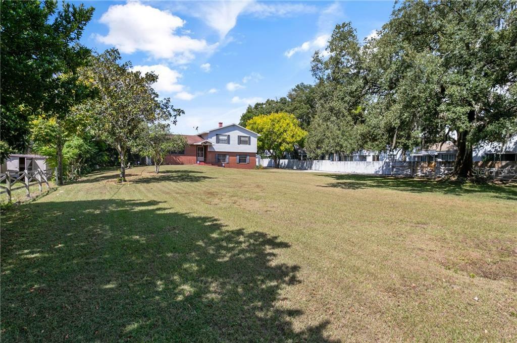 Property Photo:  5438 Long Road  FL 32808 