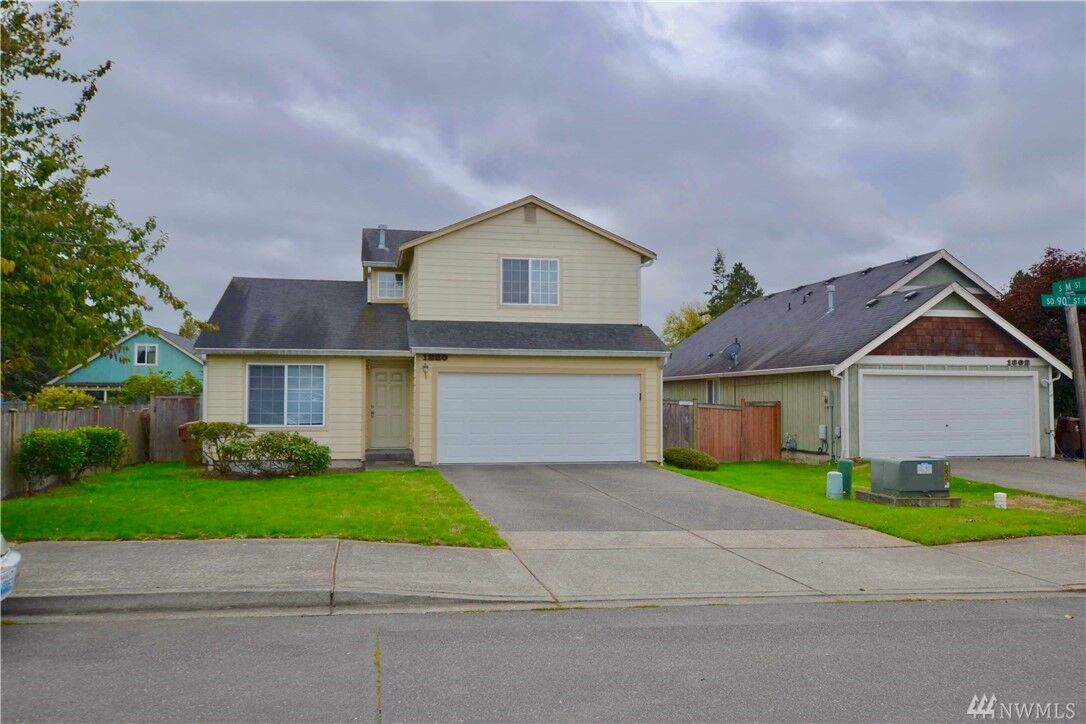 Property Photo:  1220 S 90th Stct  WA 98444 