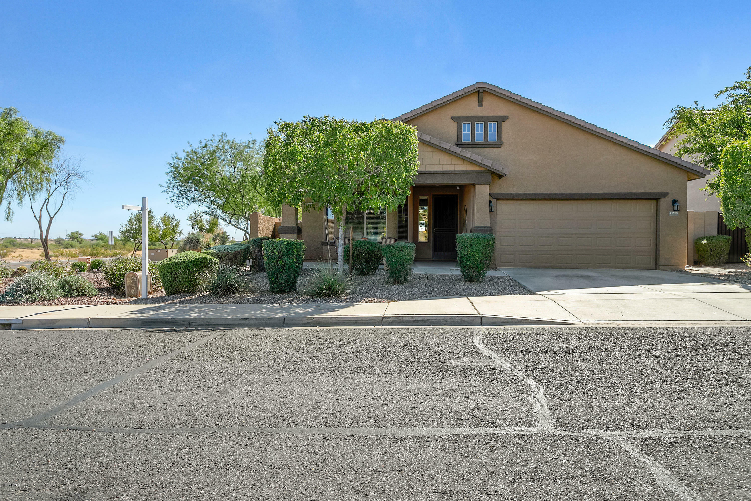 Property Photo:  11709 W Daley Lane  AZ 85373 