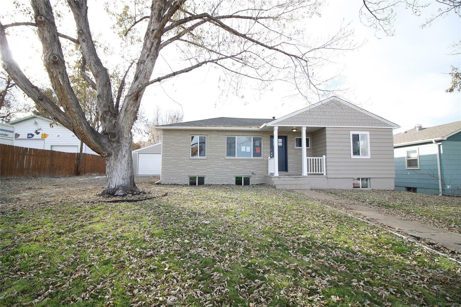 Property Photo:  4679 S Fox Street  CO 80110 