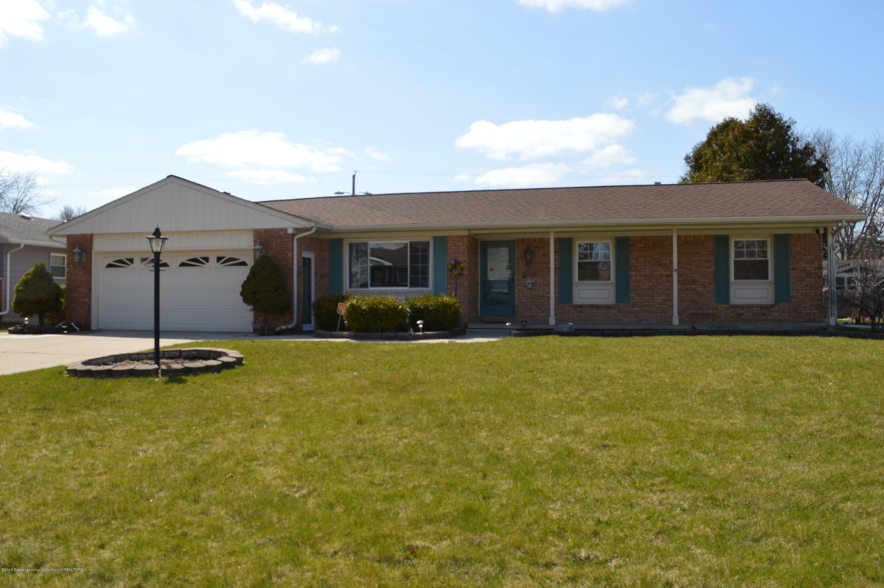 Property Photo:  426 Green Meadows Drive  MI 48917 