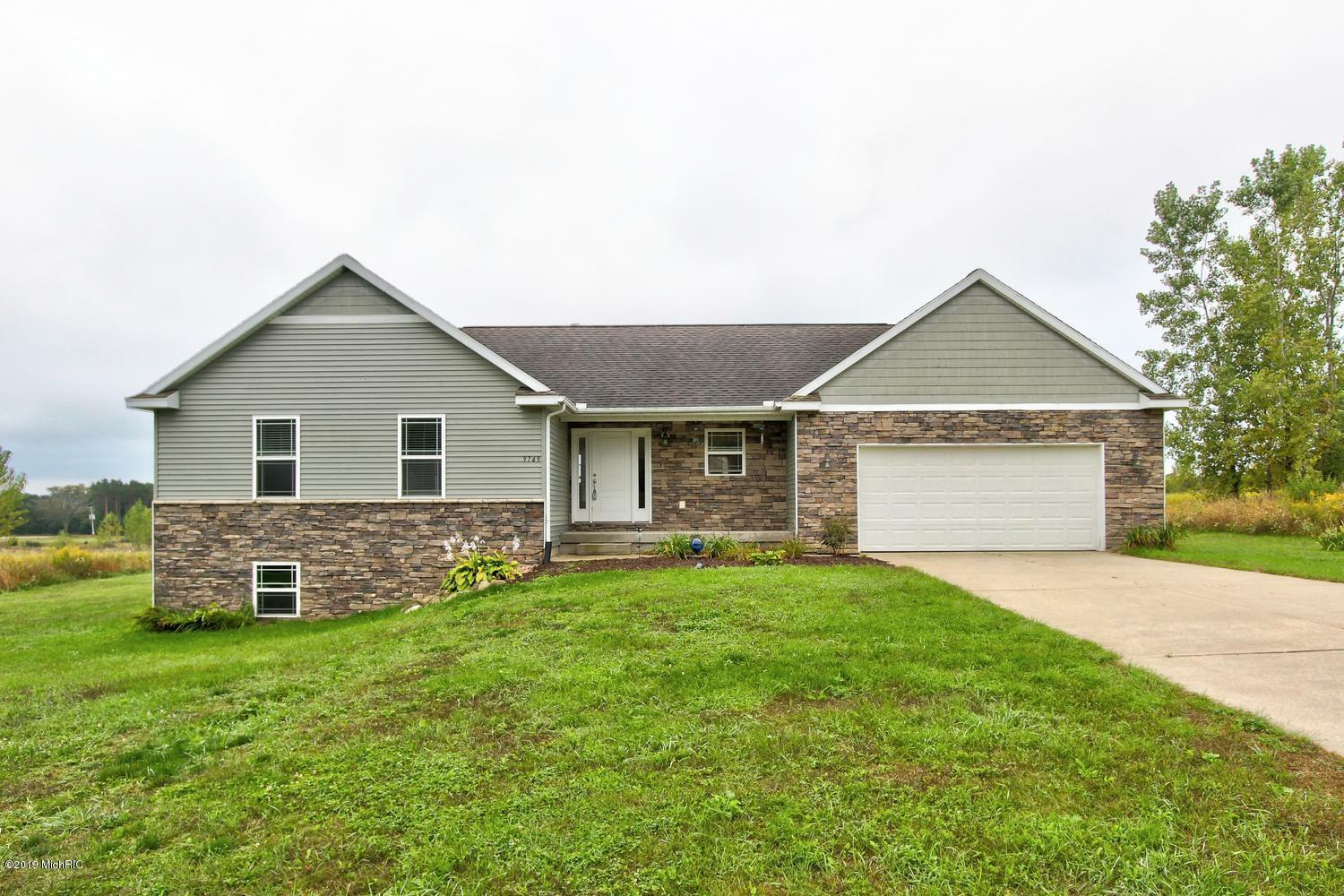 Property Photo:  9749 Iron Horse Drive  MI 48809 