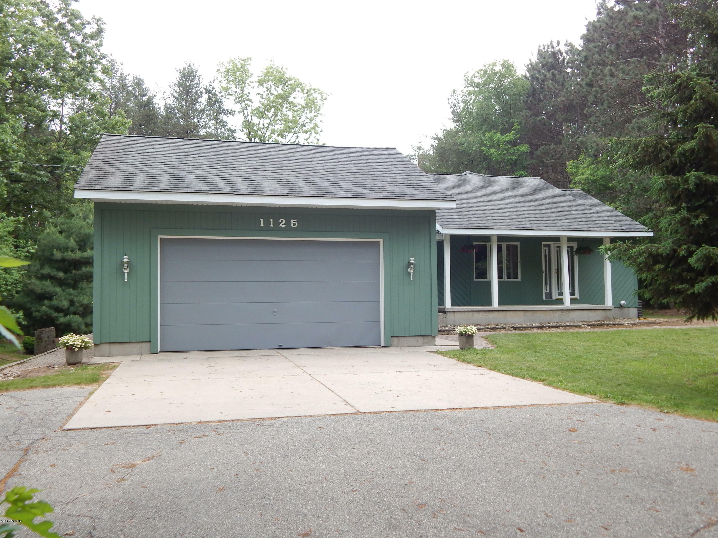 Property Photo:  1125 Red Coat Lane NE  MI 49345 