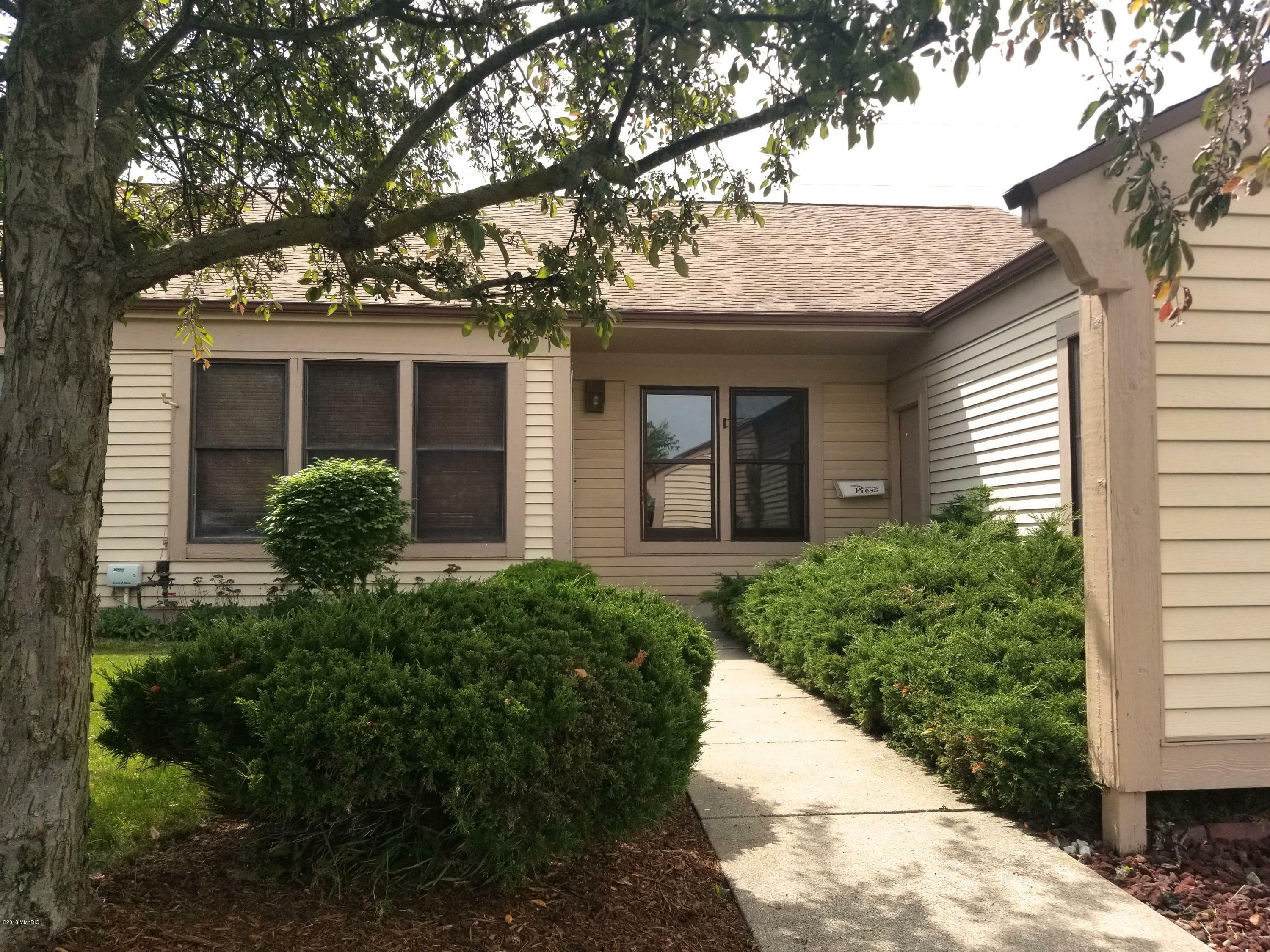 Property Photo:  295 Rolling Greene Drive NW  MI 49534 