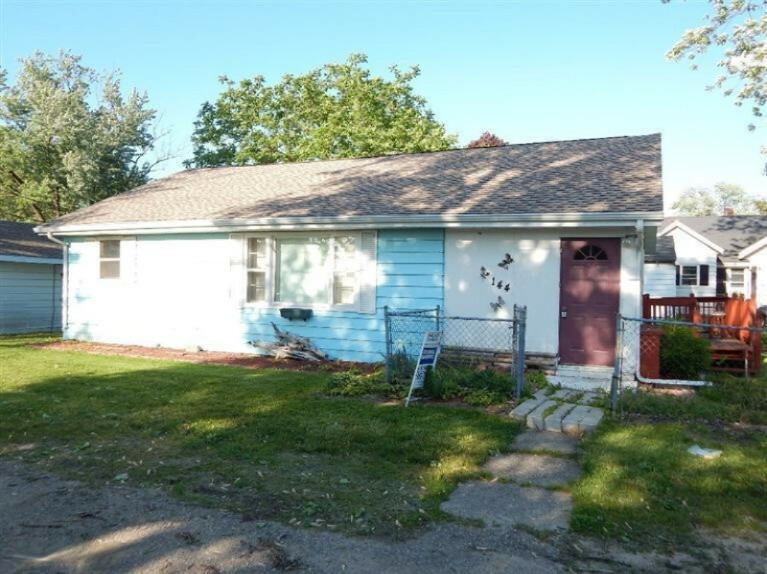 Property Photo:  144 Probasco Street  MI 49318 