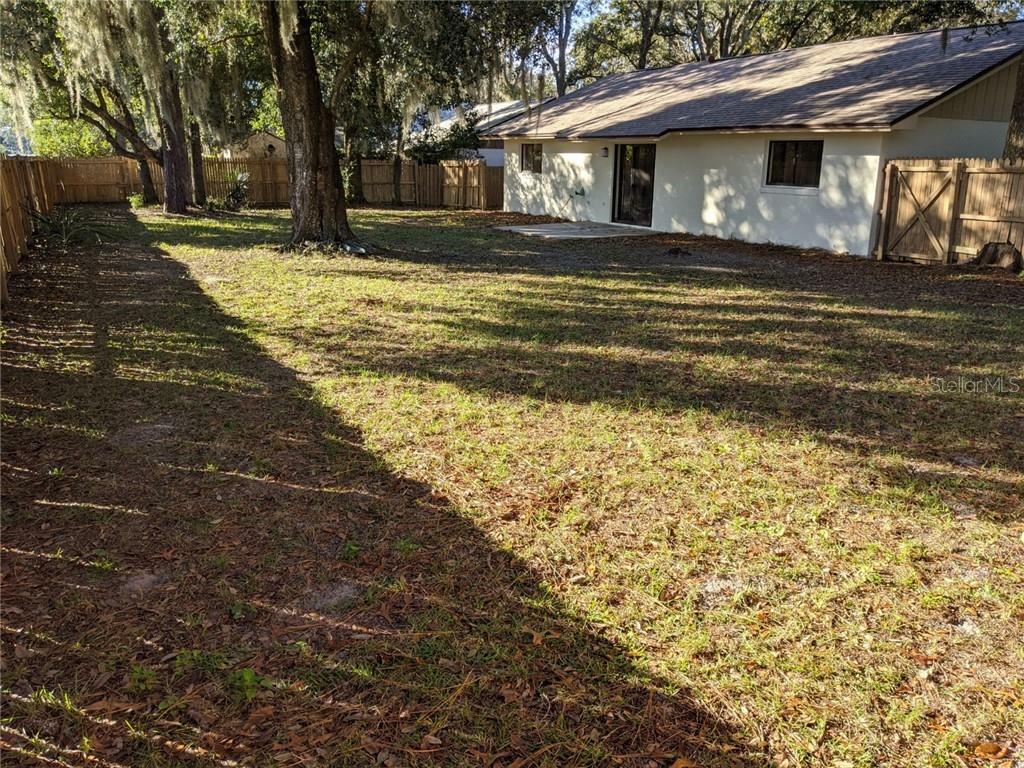 Property Photo: 8321 Camphor Tree Drive 1 FL 32810