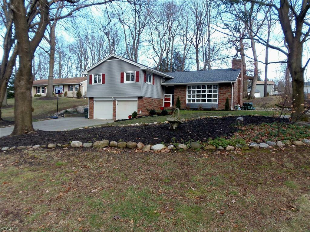 Property Photo:  717 Sleepy Hollow Drive  OH 44685 