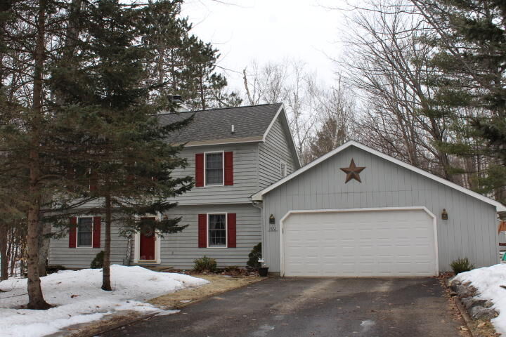 Property Photo:  7812 Woodthrush Circle  MI 49735 