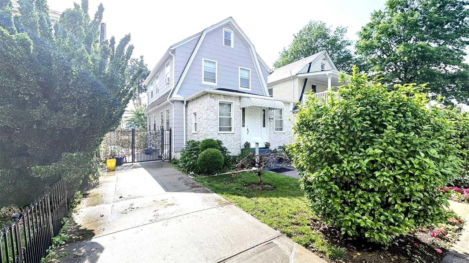 Property Photo:  94-06 215th Street  NY 11428 