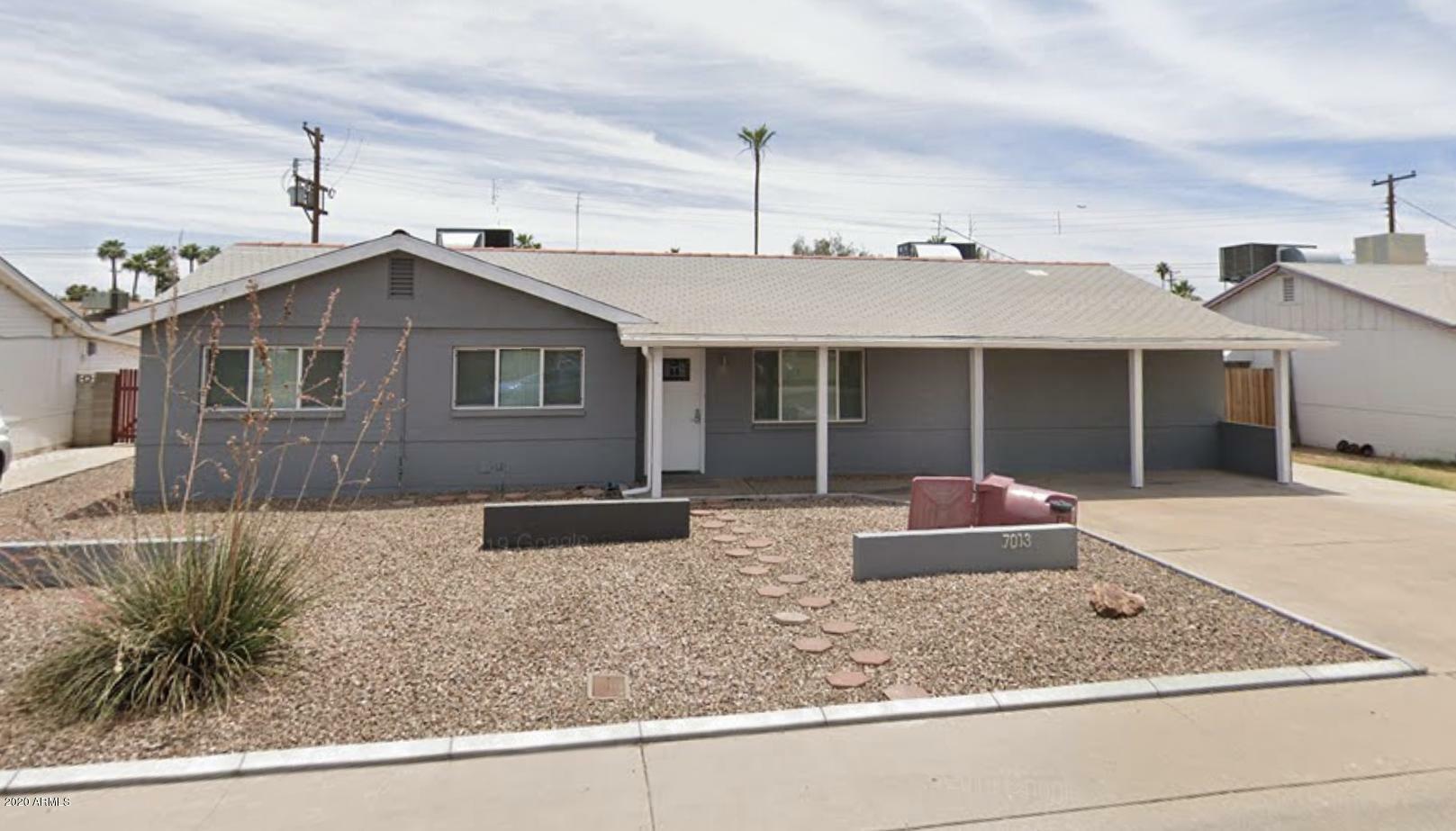 Property Photo:  7013 E Belleview Street  AZ 85257 