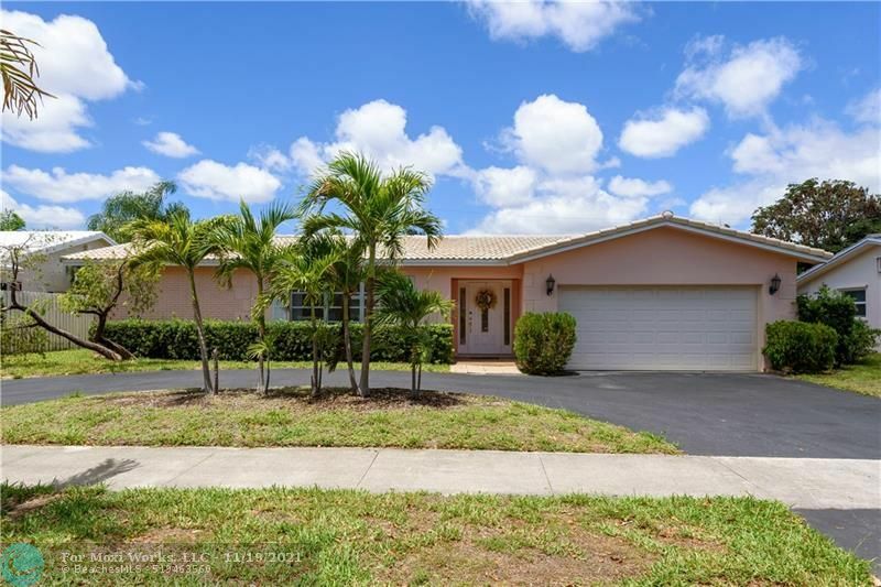 Property Photo:  5721 NE 22nd Way  FL 33308 