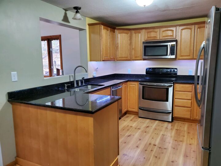 Property Photo: 49 Grey Rock Road NH 03110