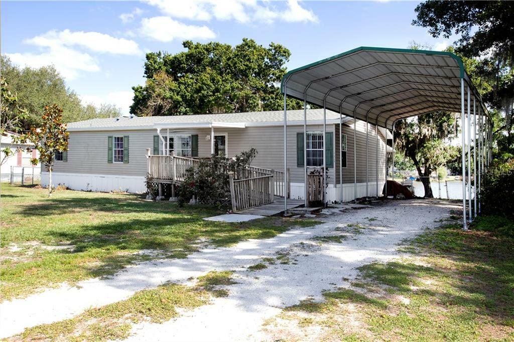 Property Photo: 10124 Kenlake Drive FL 33578