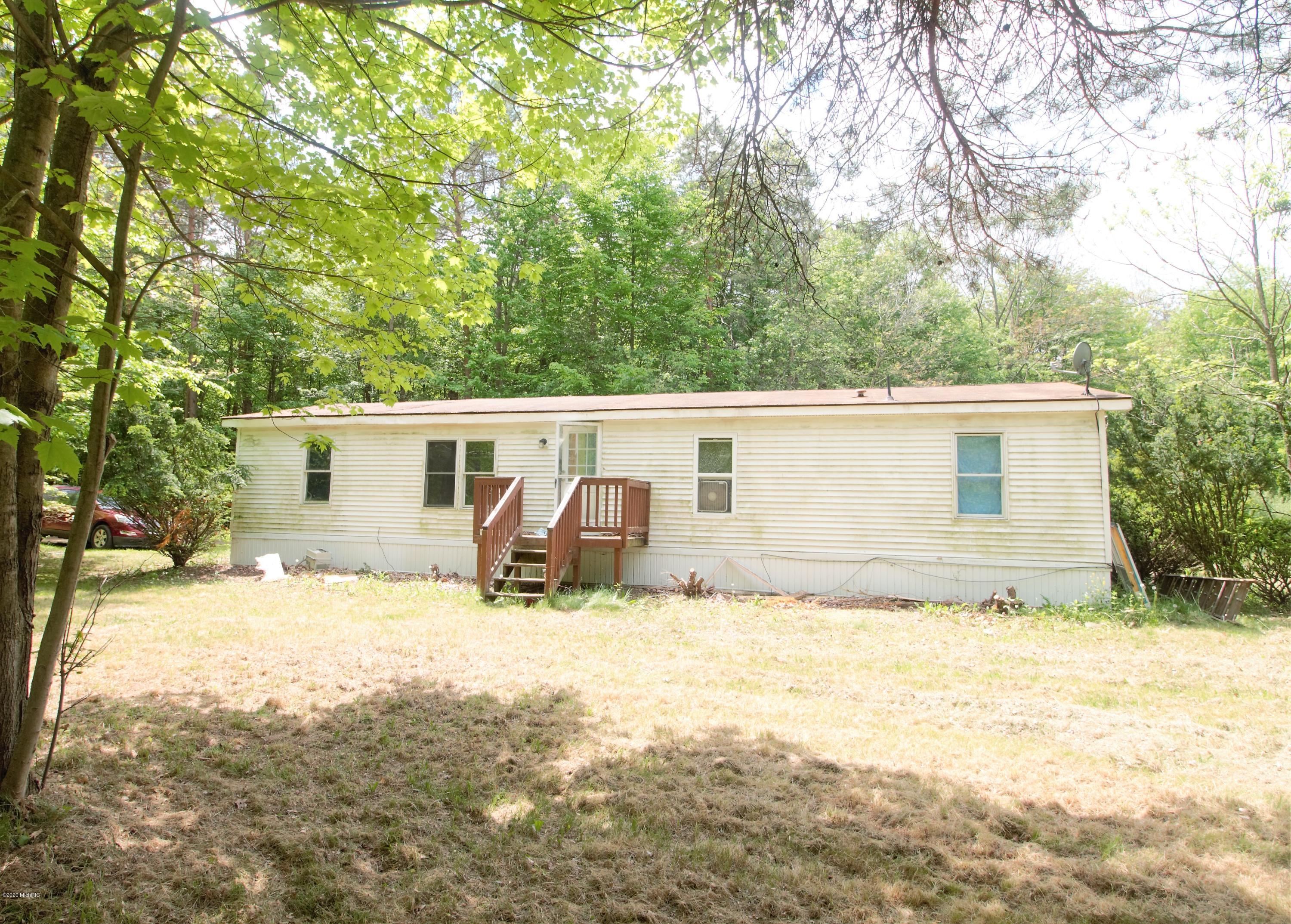 Property Photo: 16923 Trufant Avenue NE MI 49343