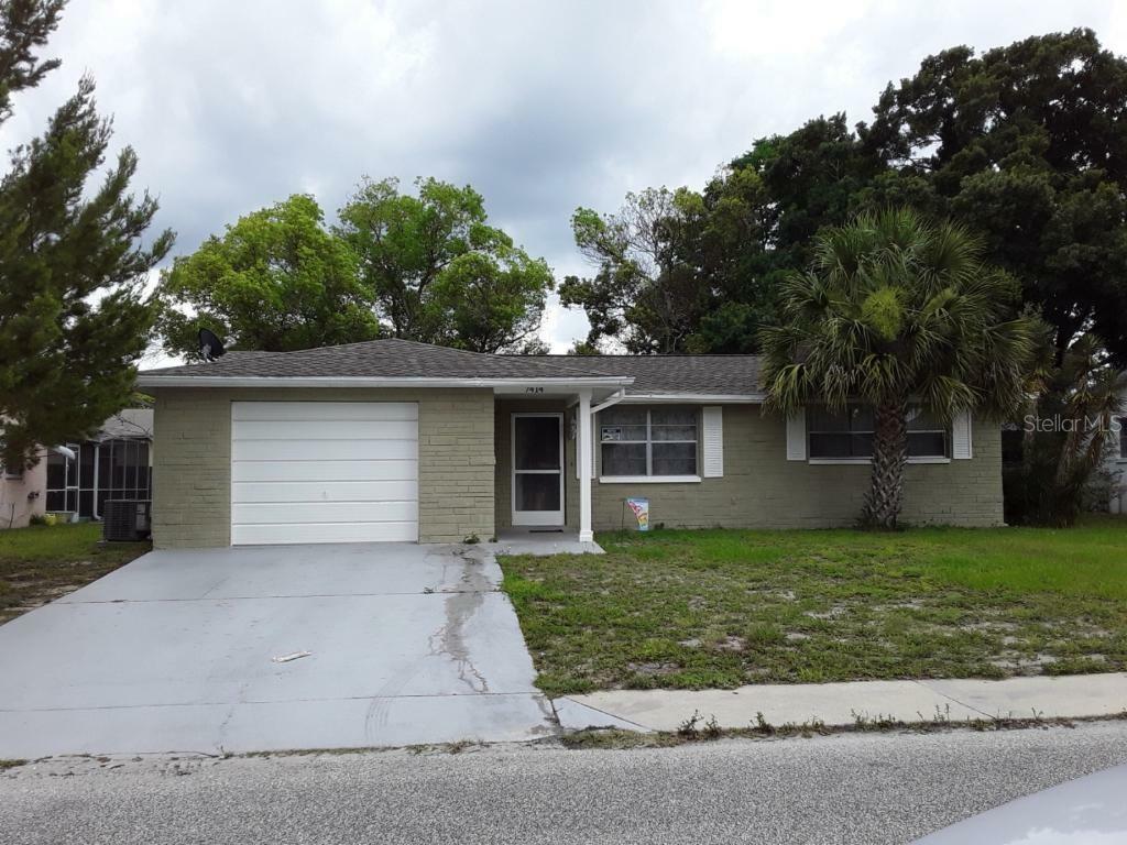 Property Photo: 7414 Bimini Drive FL 34668