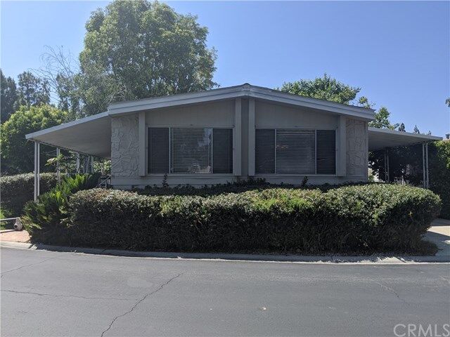 Property Photo: 24001 Muirlands Blvd 62 CA 92630