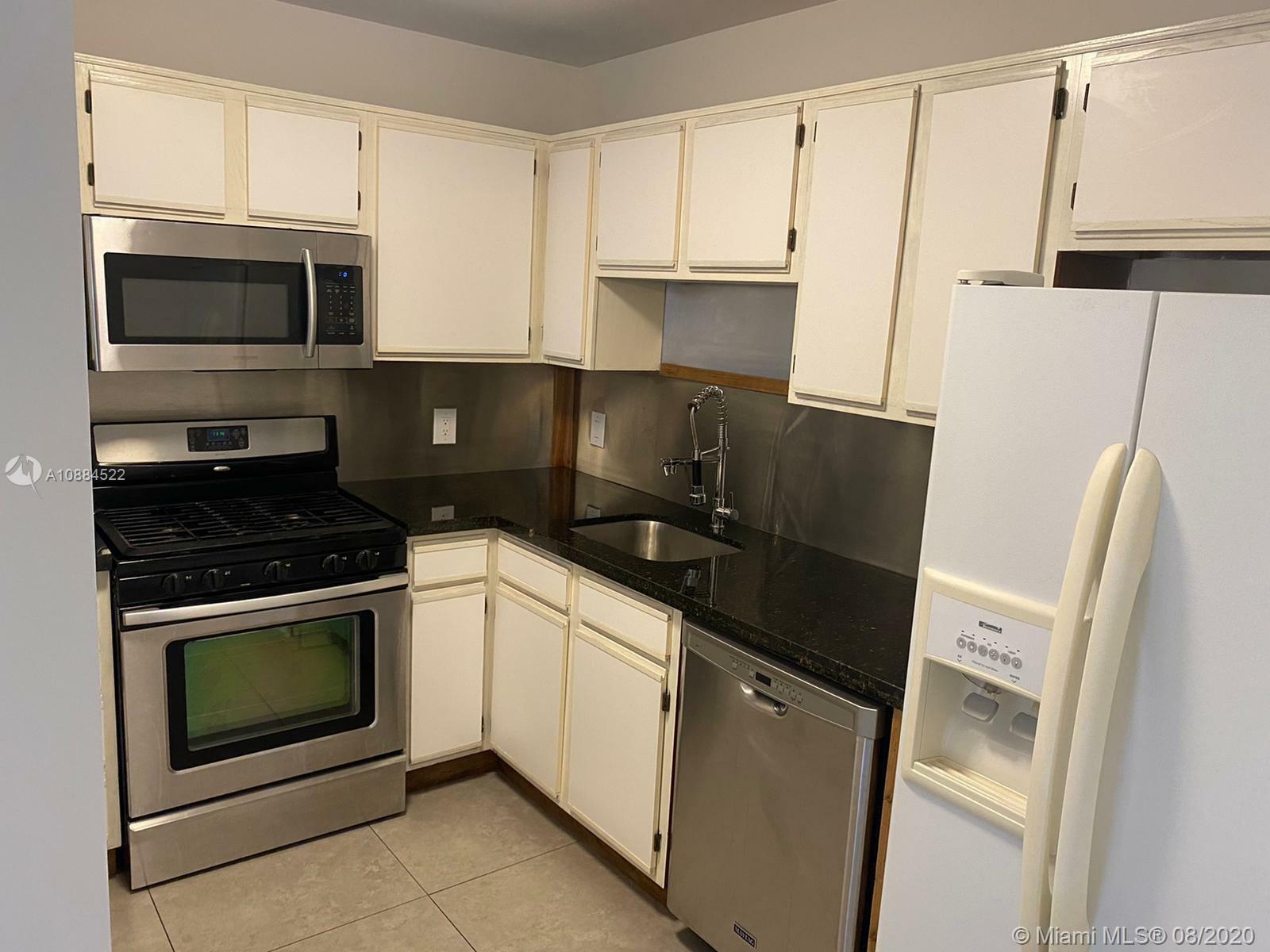 Property Photo:  15300 SW 106th Ter 508  FL 33196 