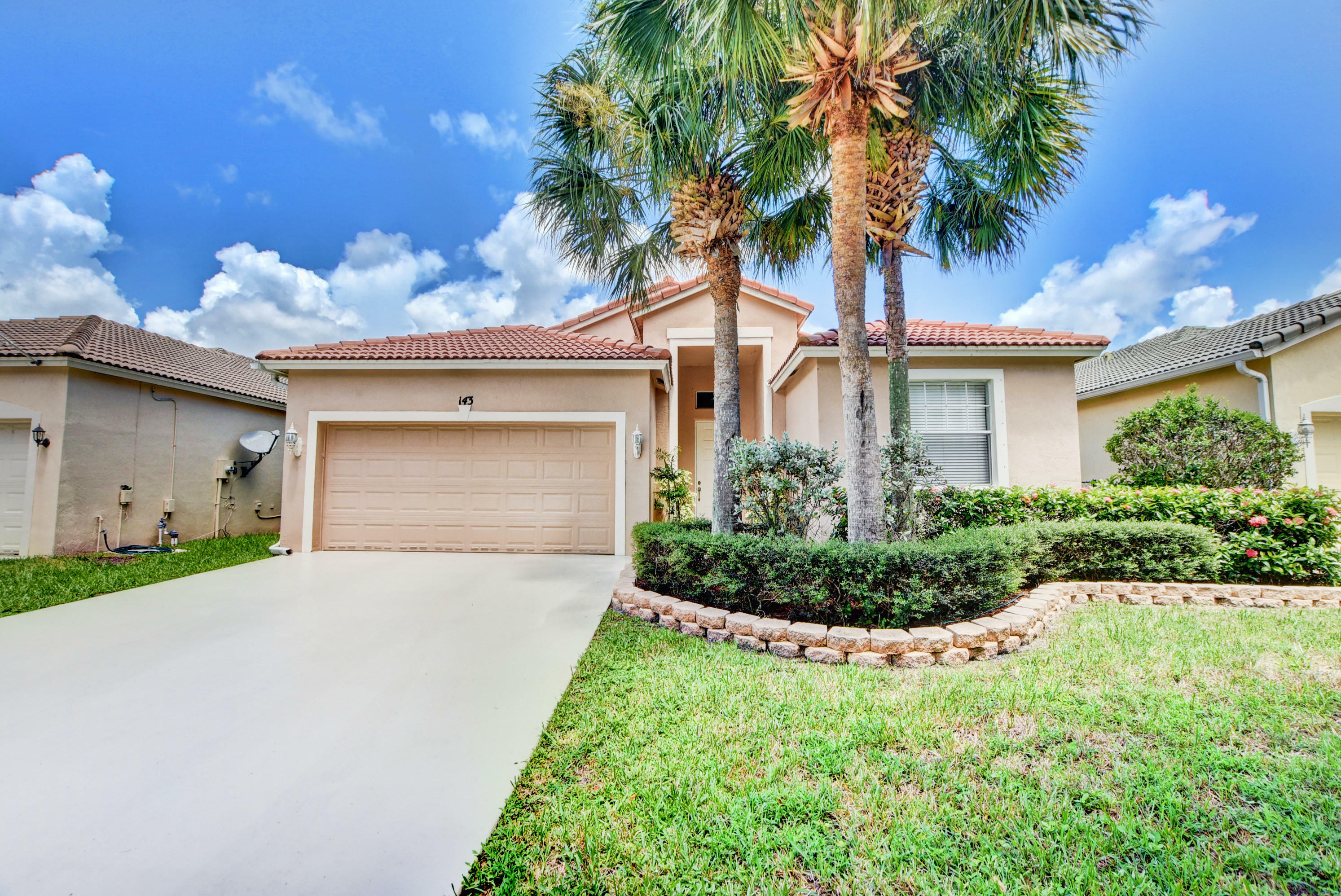 Property Photo:  143 Seminole Lakes Drive  FL 33411 