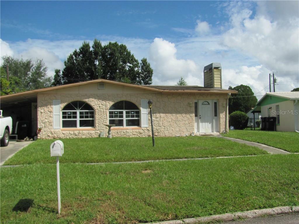 Property Photo:  7811 Grevillea Drive  FL 32822 