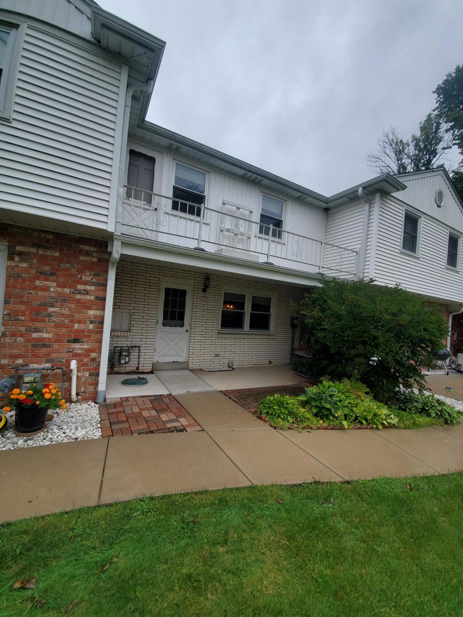 Property Photo: 4935 W Colonial Ct WI 53220