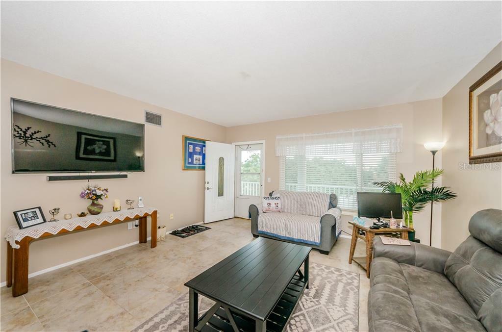 Property Photo:  2380 World Parkway Boulevard 54  FL 33763 