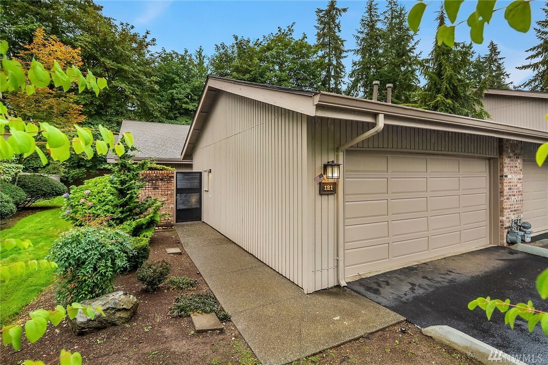Property Photo:  121 140th Place NE 132K  WA 98007 