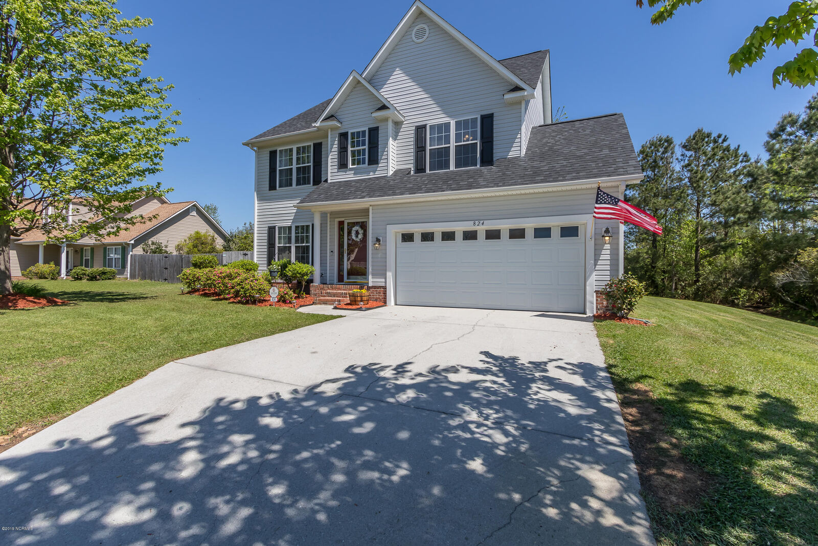 Property Photo:  824 Commons Drive N  NC 28546 