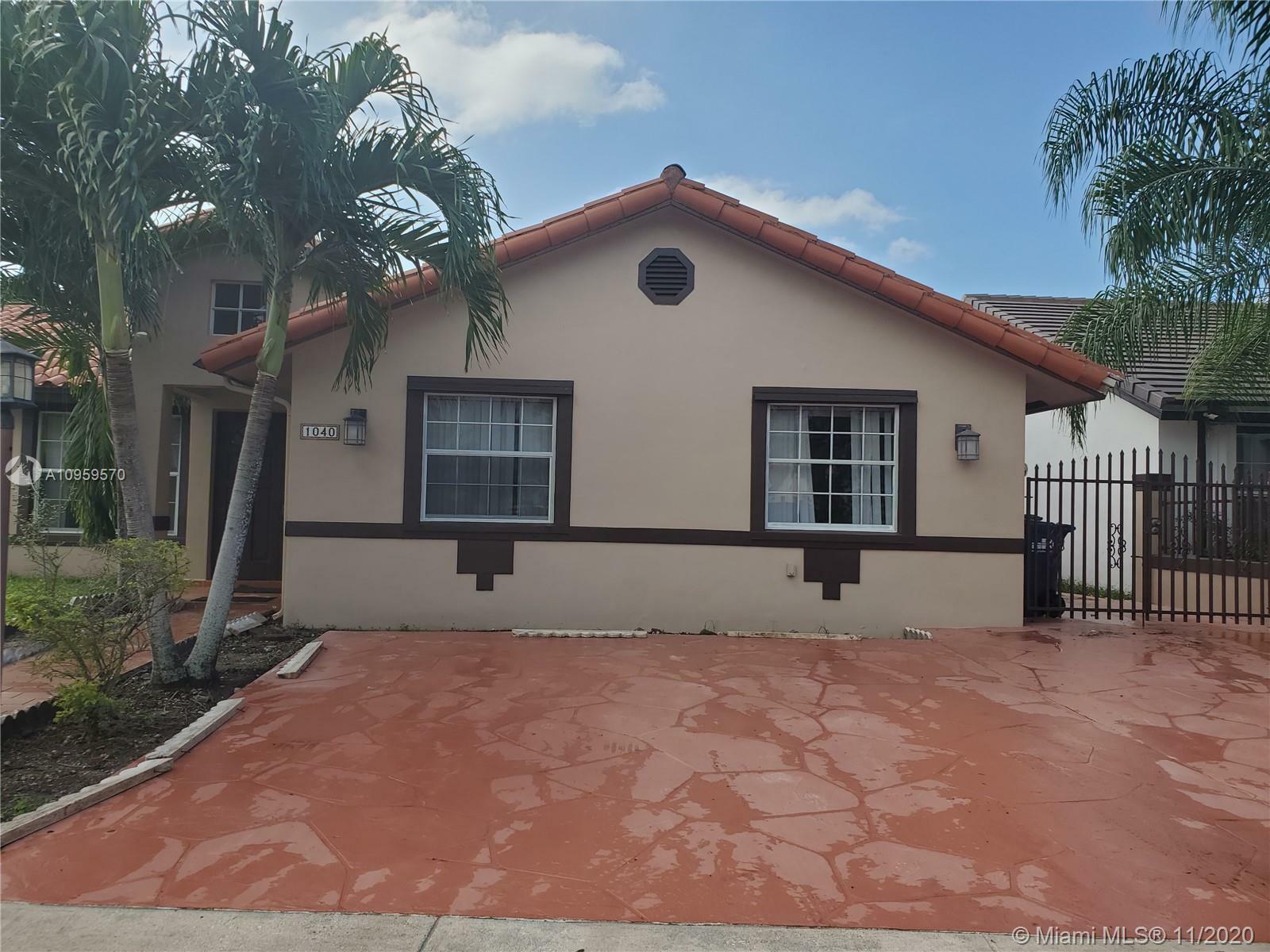 Property Photo:  1040 NW 134th Ave  FL 33182 