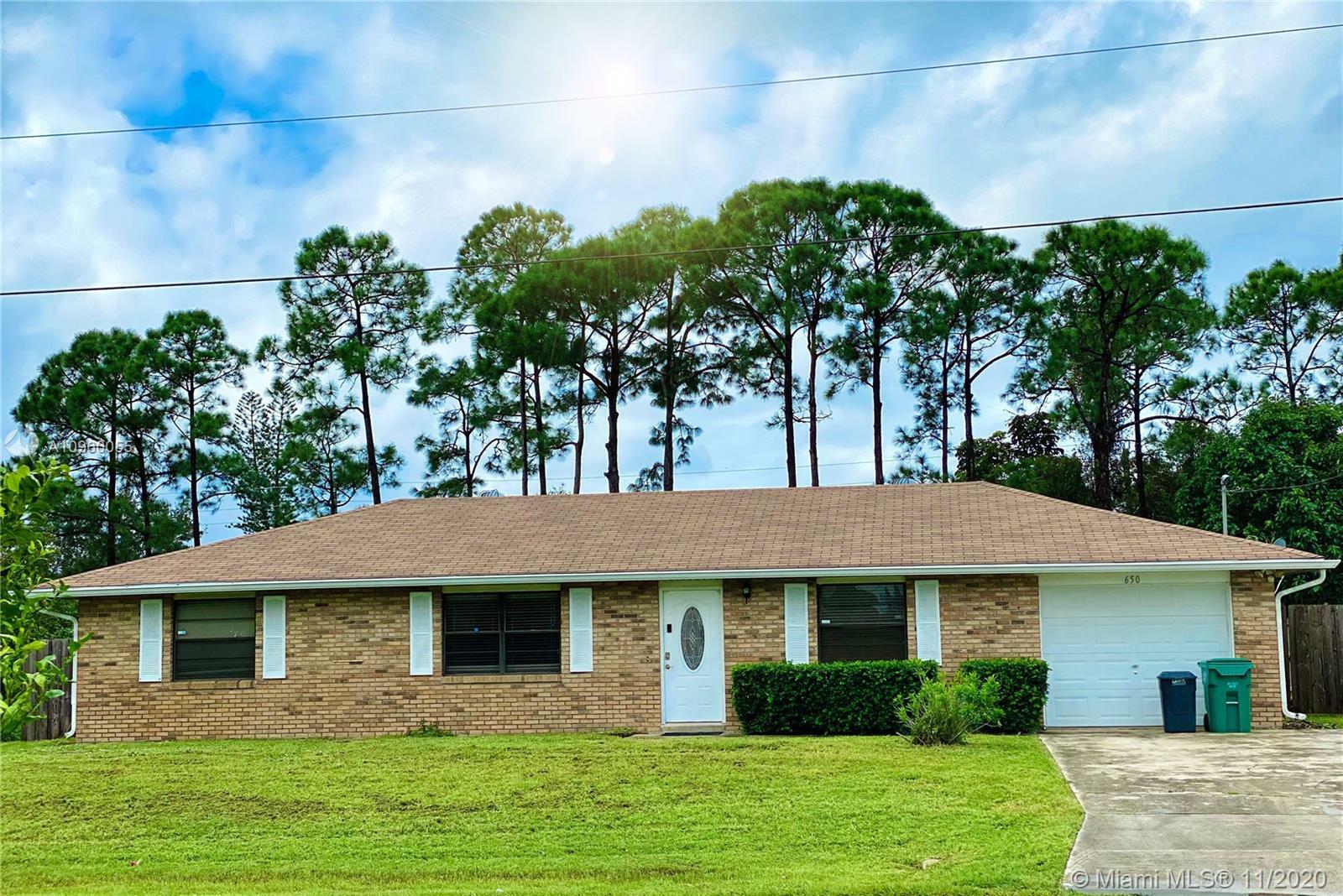 Property Photo:  650 NW Kingston St  FL 34983 