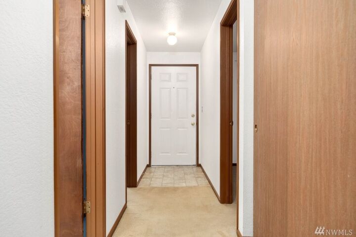 Property Photo:  325 NE Kettle St 205  WA 98277 
