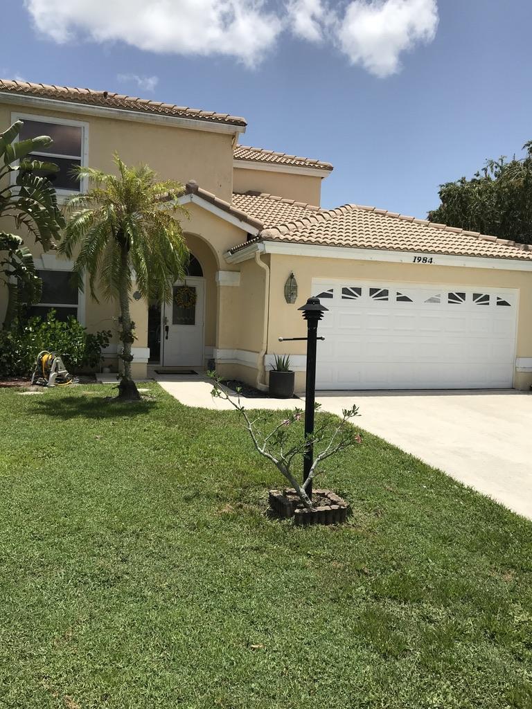 Property Photo: 1984 White Coral Way FL 33414