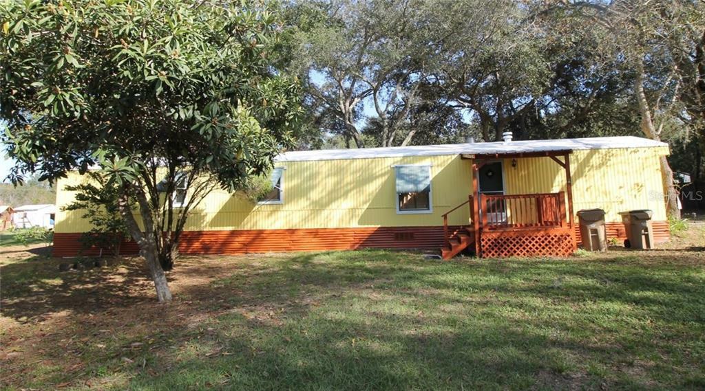 Property Photo:  18842 Triple E Road  FL 34715 