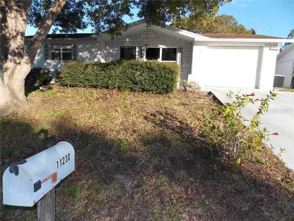 Property Photo: 11230 Yewtree Avenue FL 34668