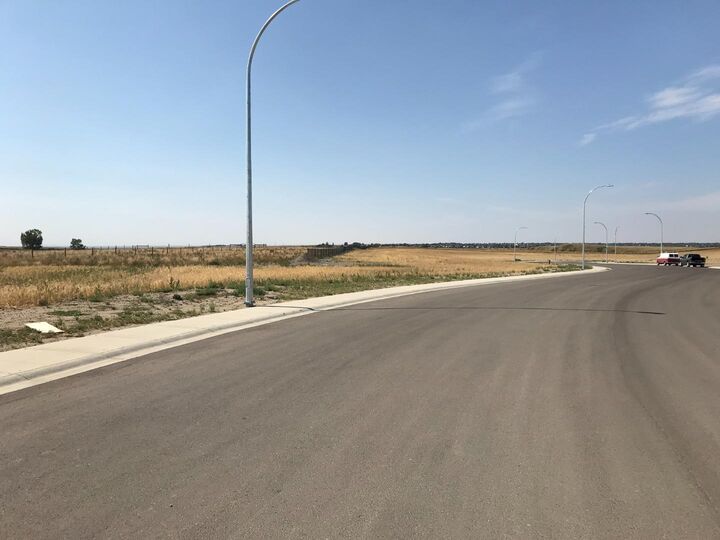 Property Photo: 118 Sandstone Road S AB T1K 8J1