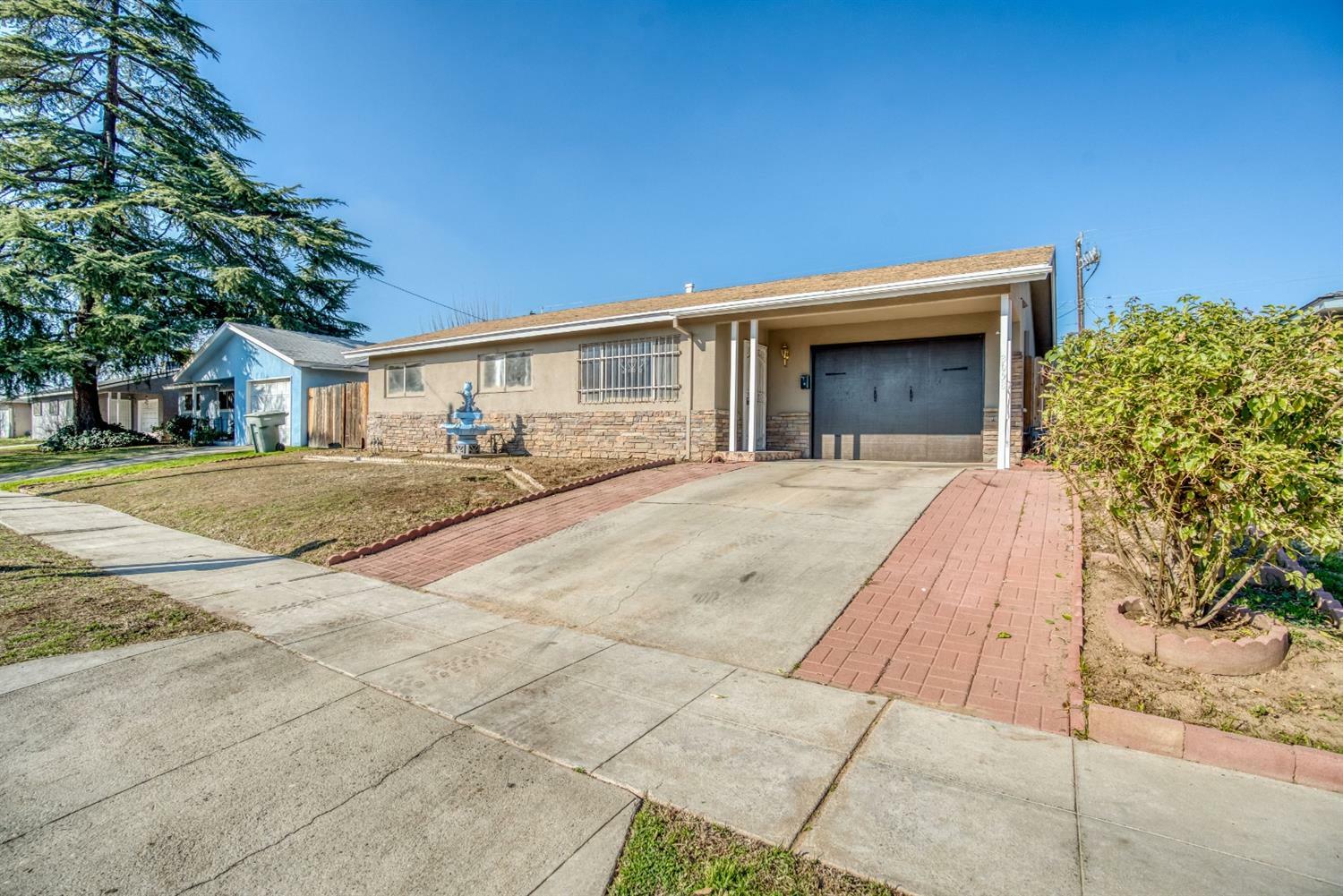 Property Photo:  3058 W Hampton Way  CA 93722 