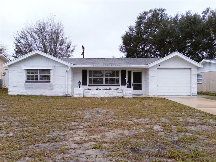 Property Photo:  7540 Camelot Road  FL 34668 