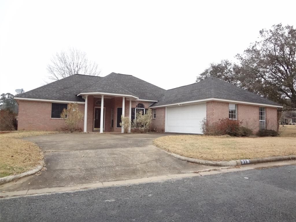 Property Photo: 319 Brookhollow Drive TX 77340