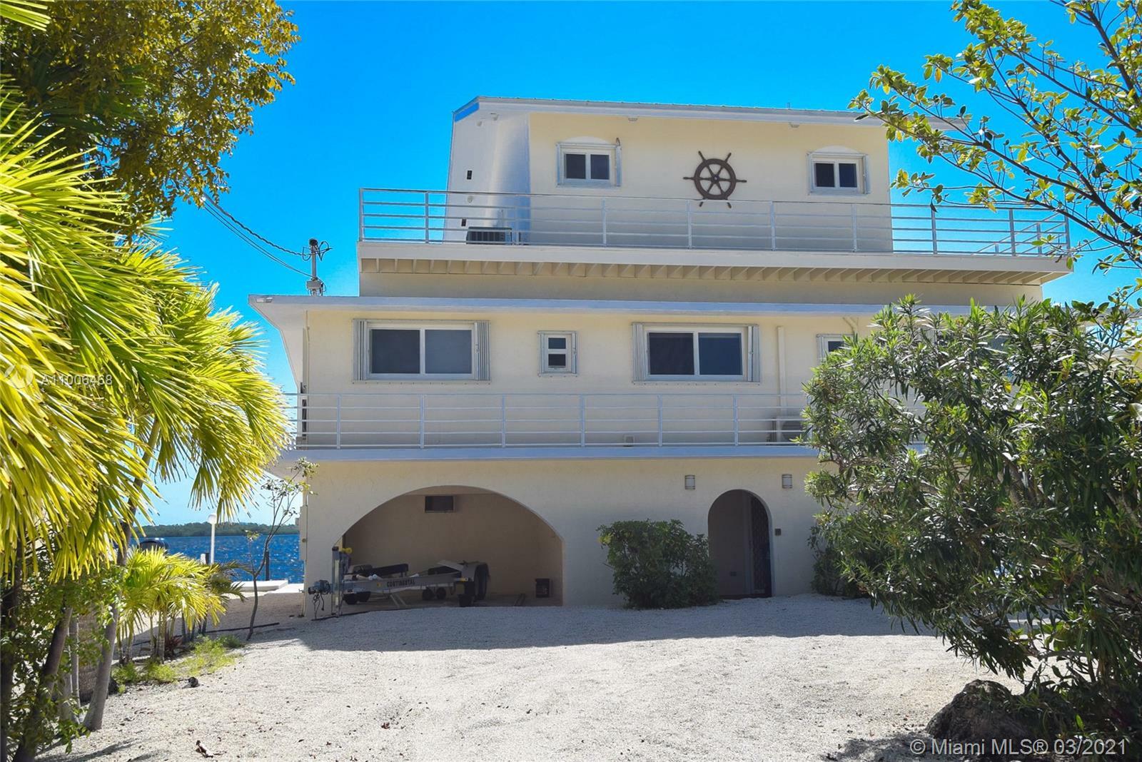 Property Photo:  606 Island Drive  FL 33037 