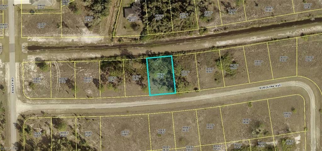 Property Photo:  747 Bobolink Avenue  FL 33974 